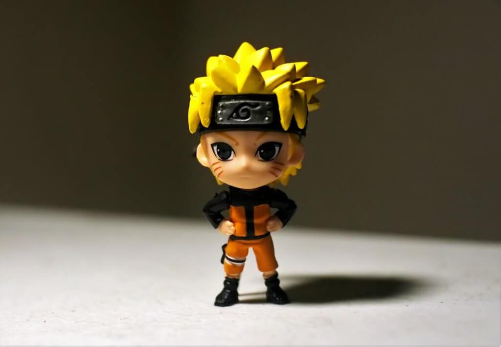 A Naruto miniature stand with its hands akimbo
