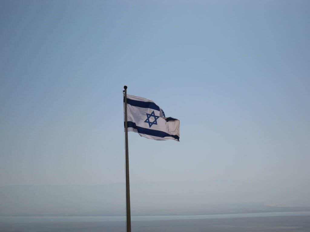 The flag of Israel waving in the air