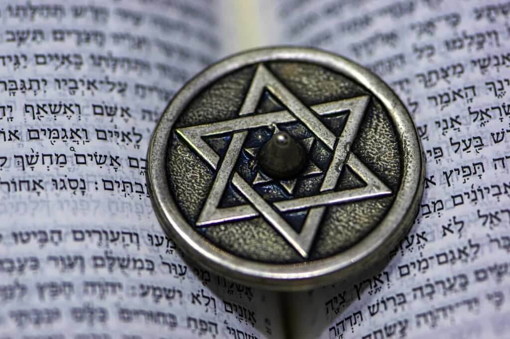 The Star of David on top of pages with Hebrew text